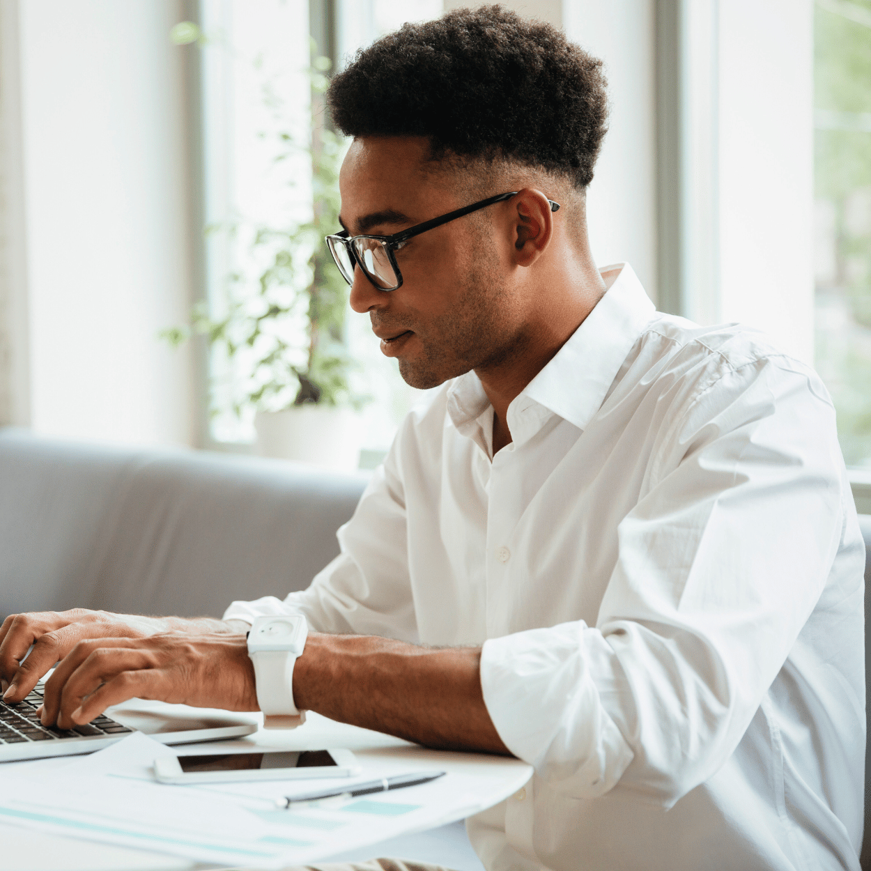 African man working on laptop